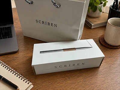 The Scriben box and bag on a desk, as the order arrives